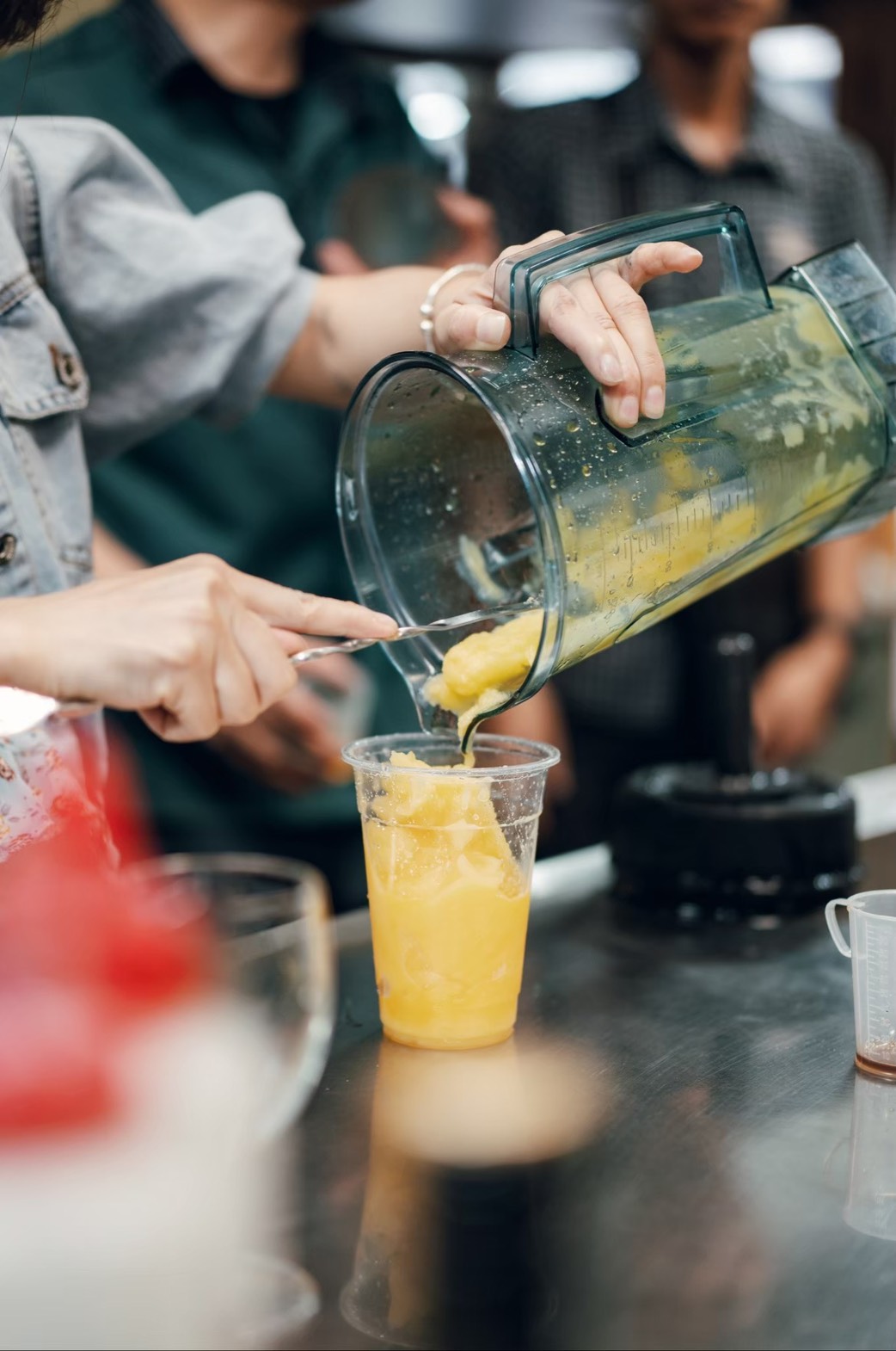 Pouring fresh fruit drink